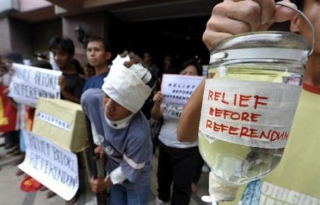 Des manifestants demandent l'autorisation de l'aide internationale avant le référendum - ©AFP